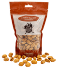 Bag of smoked bourbon pistachios with visible brand logo on a white background