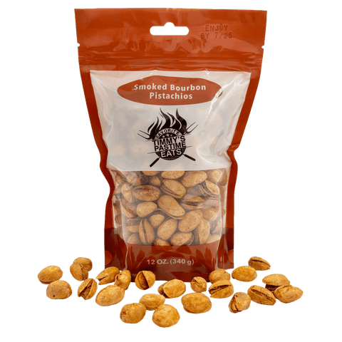 Bag of smoked bourbon pistachios with visible brand logo on a white background